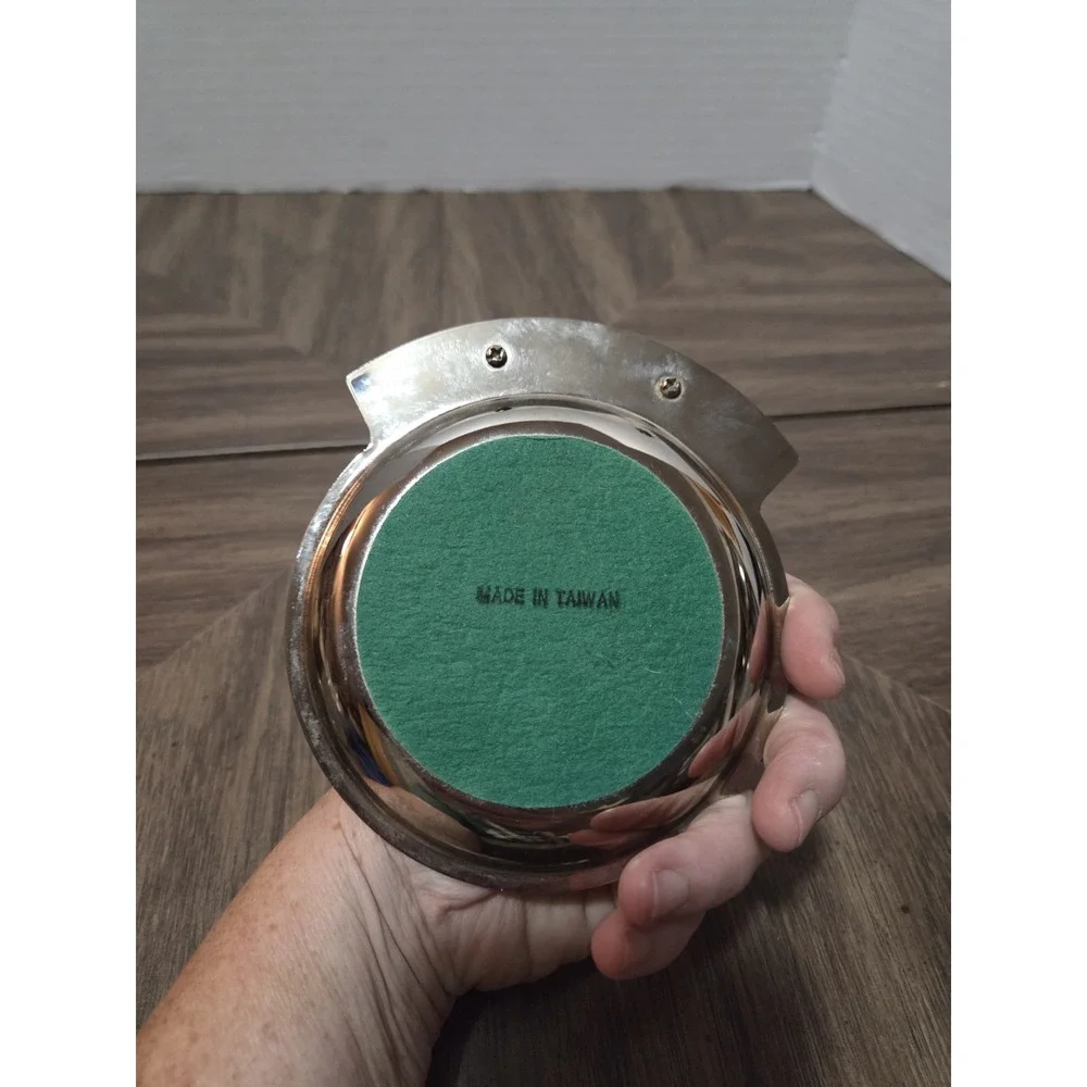 silver-tone and brass football 